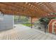This deck features a pergola, lighting, and outdoor shed at 7767 Elmwood St, Littleton, CO 80125