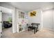 Bonus room featuring a bookshelf, keyboard, and artwork, perfect for a playroom or study at 10647 Nucla St, Commerce City, CO 80022