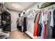 Walk-in closet featuring ample storage space with shelving and racks for organization at 10647 Nucla St, Commerce City, CO 80022