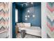 Cozy reading nook with soft textures and contemporary lighting in a stylish home at 99 S Downing St # 605, Denver, CO 80209