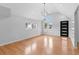 Bright and airy living room with hardwood floors, modern fixtures and beautiful natural light at 1100 Urban St, Lakewood, CO 80401