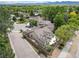 Aerial shot of a charming home featuring a backyard patio and mature landscaping at 2807 S Nelson St, Lakewood, CO 80227