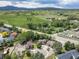 Aerial shot of a suburban home near a greenbelt, showcasing its location and neighborhood setting at 2807 S Nelson St, Lakewood, CO 80227