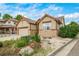 Lovely home with a two-car garage, charming stone accents and lush landscaping at 2807 S Nelson St, Lakewood, CO 80227