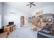 Spacious living area with vaulted ceilings, arched doorways, and a combination of carpet and wood flooring, perfect for relaxing at 2807 S Nelson St, Lakewood, CO 80227