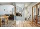 Open concept living space with vaulted ceilings and a view into the kitchen at 2807 S Nelson St, Lakewood, CO 80227
