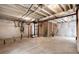 Unfinished basement with high ceilings, offering potential for customization at 24851 E 33Rd Dr, Aurora, CO 80019