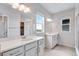 Bathroom features double vanity with solid surface counters, and a glass enclosed shower at 24851 E 33Rd Dr, Aurora, CO 80019