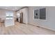 Bright, eat-in kitchen features stainless appliances and an island with a breakfast bar for easy entertaining at 24851 E 33Rd Dr, Aurora, CO 80019