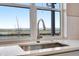 Kitchen counter top featuring a stainless steel sink and a view of the landscape at 24851 E 33Rd Dr, Aurora, CO 80019