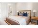 Well-decorated bedroom featuring a plush bed and elegant side tables at 8240 E 36Th Ave # 33, Denver, CO 80238