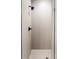 Tiled shower stall features a sleek design with a matte black shower head and faucet fixture at 8240 E 36Th Ave # 33, Denver, CO 80238