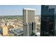An aerial view of a high-rise building in a bustling cityscape at 1891 Curtis St # 1613, Denver, CO 80202