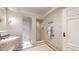 Well-lit bathroom with a walk-in shower featuring sleek fixtures and elegant tile work at 1891 Curtis St # 1613, Denver, CO 80202