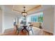 Bright dining area featuring large windows with city views and modern lighting fixtures at 1891 Curtis St # 1613, Denver, CO 80202