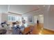 Bright and airy living room with large windows, hardwood floors, and stylish furnishings at 1891 Curtis St # 1613, Denver, CO 80202