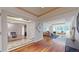 Bright, open-concept living room featuring hardwood floors and ample natural light at 1891 Curtis St # 1613, Denver, CO 80202