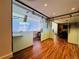 The office space showcases modern glass sliding doors and contemporary lighting at 1891 Curtis St # 1613, Denver, CO 80202