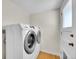 Laundry room featuring a white washer and dryer set with a white door at 3790 E Geddes Ave, Centennial, CO 80122