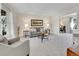 Cozy living room with plush seating, neutral decor, and ample natural light at 3790 E Geddes Ave, Centennial, CO 80122