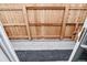 View of a tall backyard privacy fence from an open sliding glass door to the interior at 5375 W 14Th Ave, Lakewood, CO 80214