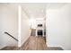 View of the home's entryway and staircase leading to the kitchen at 5375 W 14Th Ave, Lakewood, CO 80214