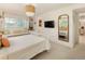 Bright bedroom featuring a built-in window seat, ample storage, and a stylish interior design at 15 South Ln, Cherry Hills Village, CO 80113