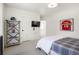 Cozy bedroom featuring a built-in shelving, wall decor and plenty of natural light at 15 South Ln, Cherry Hills Village, CO 80113