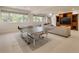 Large game room with a ping pong table and comfortable seating for leisure and entertainment indoors at 15 South Ln, Cherry Hills Village, CO 80113
