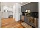 The kitchen features custom cabinets, modern appliances, and a marble backsplash, blending style and functionality at 15 South Ln, Cherry Hills Village, CO 80113