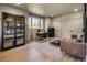 Spacious home office with modern desk, comfortable seating, lots of storage and natural light at 15 South Ln, Cherry Hills Village, CO 80113