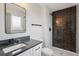 Modern bathroom features subway tile in shower, sleek vanity, and modern fixtures at 9435 Osceola St, Westminster, CO 80031