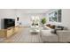 Bright and stylish living room with comfortable seating and a view of the dining area at 9435 Osceola St, Westminster, CO 80031