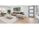 Bright living room with modern furnishings, hardwood floors, and stylish decor at 9435 Osceola St, Westminster, CO 80031