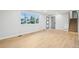 Bright living room featuring large windows, and a modern door at 9435 Osceola St, Westminster, CO 80031