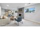 Cozy living room featuring a fireplace, mounted TV, and comfortable seating at 9435 Osceola St, Westminster, CO 80031