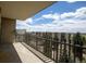 Spacious balcony with views of trees and neighboring buildings at 14390 E Marina Dr # 601, Aurora, CO 80014