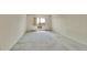 Bright bedroom features carpet floors, a window with natural light, and neutral walls at 14390 E Marina Dr # 601, Aurora, CO 80014
