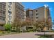 Apartment building with mature trees and landscaping at 14390 E Marina Dr # 601, Aurora, CO 80014