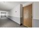 Hallway with carpet and neutral color walls and trim at 14390 E Marina Dr # 601, Aurora, CO 80014