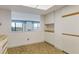 Bright kitchen area showcasing ample cabinet space and natural light at 14390 E Marina Dr # 601, Aurora, CO 80014