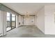 Bright living room with sliding glass doors leading to a balcony at 14390 E Marina Dr # 601, Aurora, CO 80014