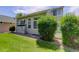 Well-maintained backyard with lush lawn and mature landscaping for outdoor enjoyment at 2608 S Troy Ct, Aurora, CO 80014