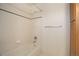 Bright bathroom featuring shower with tile surround and bathtub at 2608 S Troy Ct, Aurora, CO 80014
