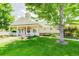 Charming community clubhouse featuring a welcoming porch and well-maintained landscaping, perfect for gatherings at 2608 S Troy Ct, Aurora, CO 80014