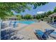 Inviting community pool with comfortable lounge chairs, offering a perfect spot for relaxation and summer fun at 2608 S Troy Ct, Aurora, CO 80014
