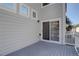 Back deck with sliding glass door access from the home's interior at 2608 S Troy Ct, Aurora, CO 80014