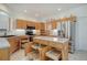 Bright kitchen with ample cabinet space, stainless steel appliances and a functional island at 2608 S Troy Ct, Aurora, CO 80014