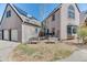 Home exterior featuring garden beds, rock landscaping and detached two car garage at 1057 Reed Ranch Rd, Boulder, CO 80302