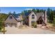 Charming home with a two-car garage and solar panels on the roof situated in a serene and picturesque landscape at 1057 Reed Ranch Rd, Boulder, CO 80302